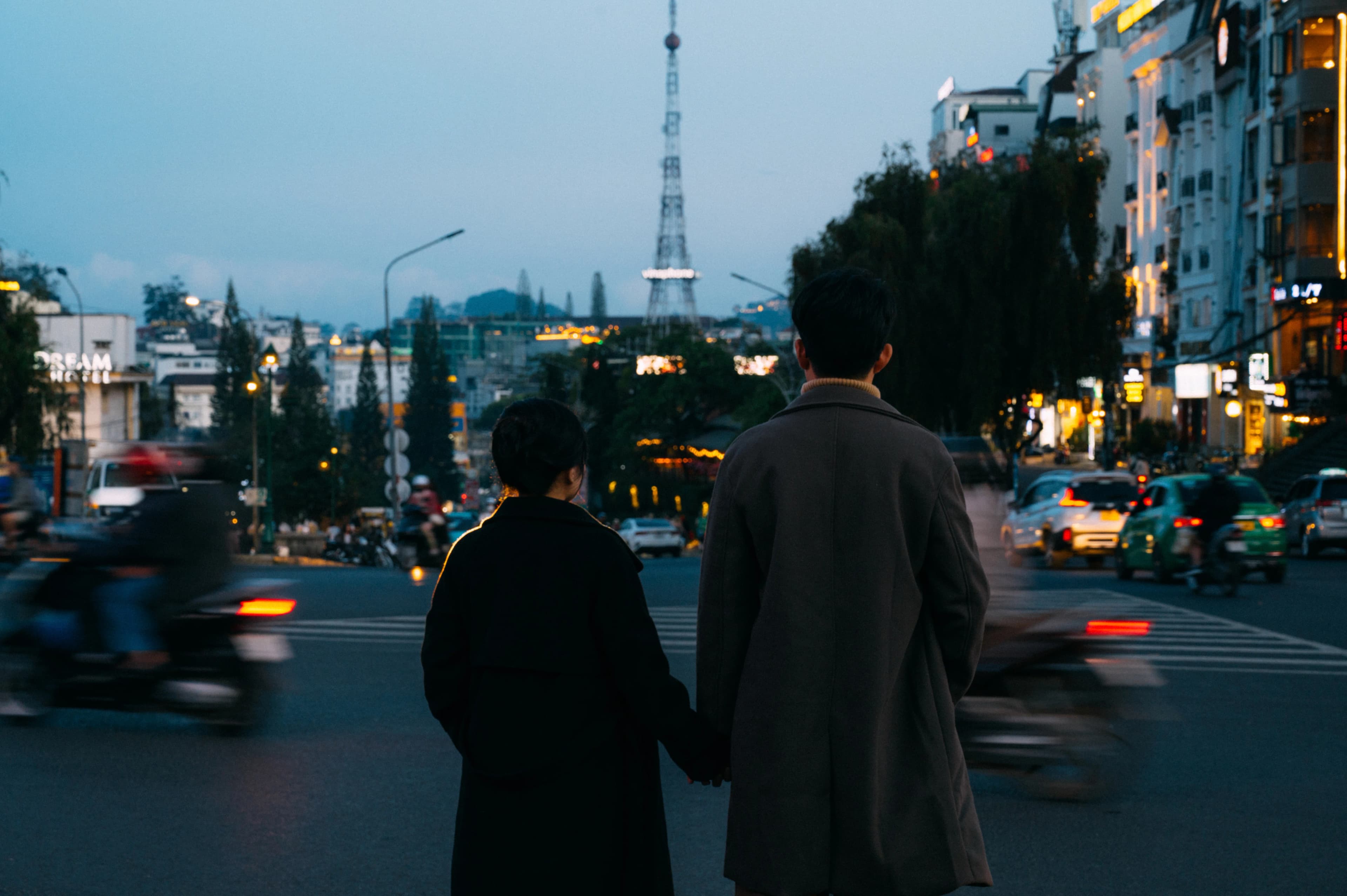 Beautiful white wedding arch with green foliage